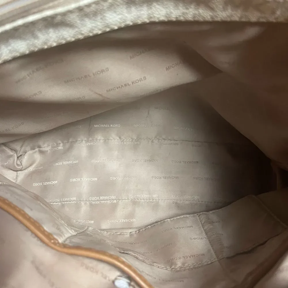 Michael Kors Beige signature Coated Canvas tote , tan leather straps .